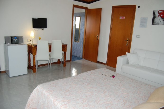 Imagen de la habitación del Hotel Il Mirto E La Rosa es. Foto 5