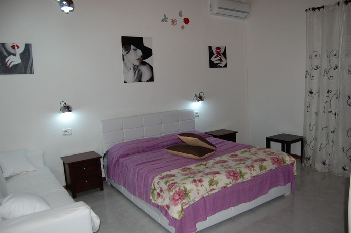 Imagen de la habitación del Hotel Il Mirto E La Rosa es. Foto 6