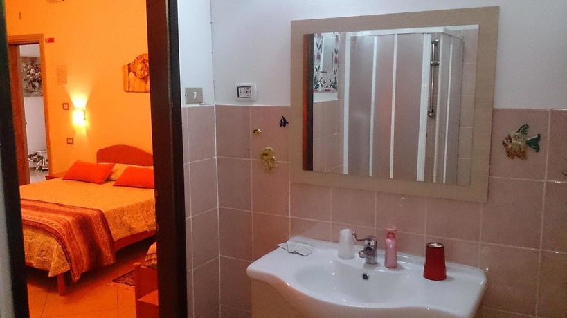 Imagen de la habitación del Hotel Il Mirto E La Rosa es. Foto 8