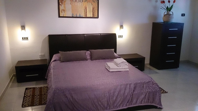 Imagen de la habitación del Hotel Il Mirto E La Rosa es. Foto 11