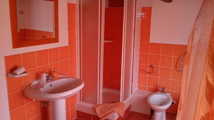 Imagen de la habitación del Hotel Il Mirto E La Rosa es. Foto 13