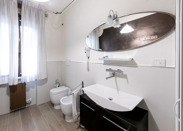 Imagen de la habitación del Hotel Il Novecento. Foto 14