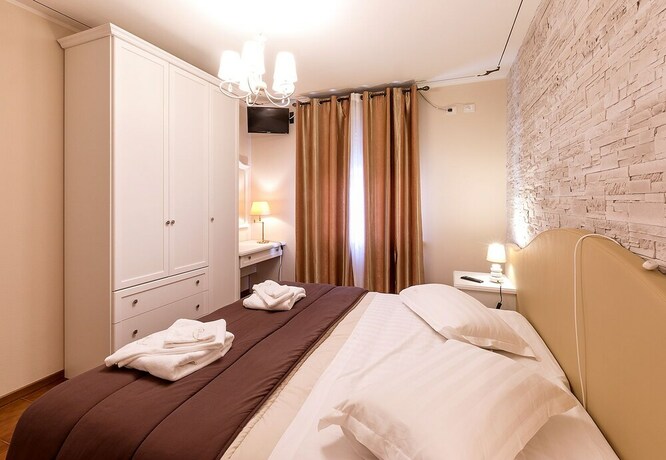 Imagen de la habitación del Hotel Il Novecento. Foto 20