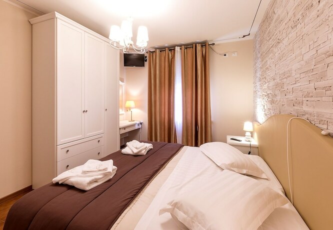Imagen de la habitación del Hotel Il Novecento. Foto 25