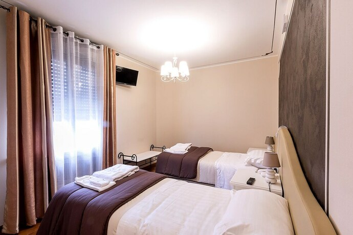 Imagen de la habitación del Hotel Il Novecento. Foto 26