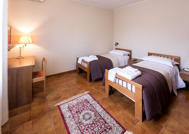 Imagen de la habitación del Hotel Il Novecento. Foto 28