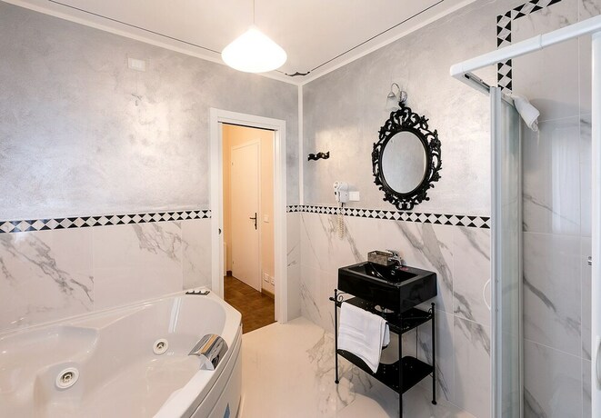 Imagen de la habitación del Hotel Il Novecento. Foto 30