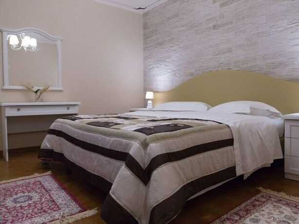 Imagen de la habitación del Hotel Il Novecento. Foto 32