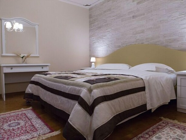 Imagen de la habitación del Hotel Il Novecento. Foto 34