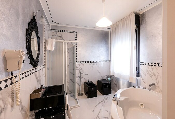 Imagen de la habitación del Hotel Il Novecento. Foto 35