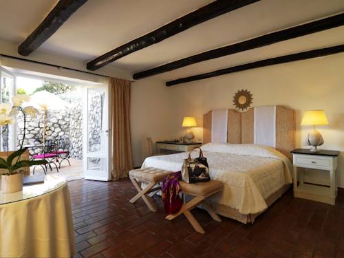 Imagen de la habitación del Hotel Il Pellicano. Foto 15