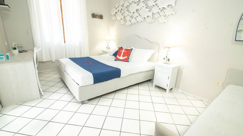 Imagen de la habitación del Hotel Il Perseo. Foto 15