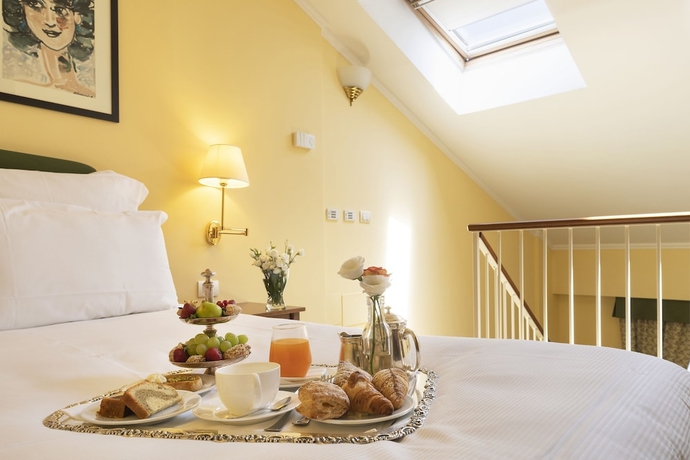 Imagen de la habitación del Hotel Il Picciolo Etna Golf Resort & Spa. Foto 7