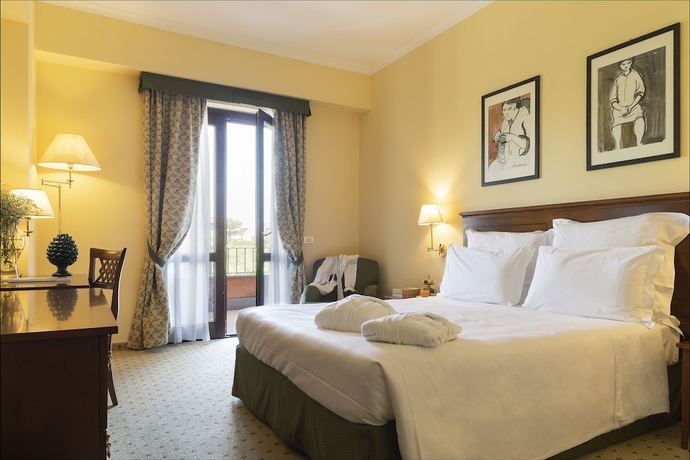 Imagen de la habitación del Hotel Il Picciolo Etna Golf Resort & Spa. Foto 8