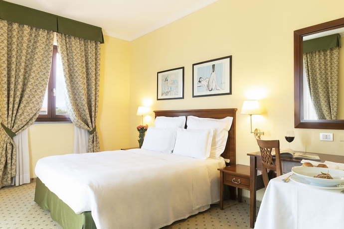 Imagen de la habitación del Hotel Il Picciolo Etna Golf Resort & Spa. Foto 12