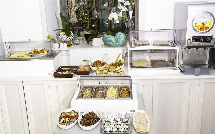 Imagen del bar/restaurante del Hotel Il Piccolo Giardino. Foto 2