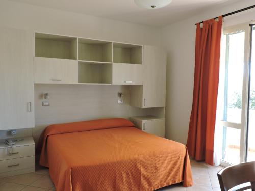 Imagen de la habitación del Hotel Il Pino, San Vincenzo. Foto 7