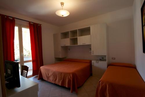 Imagen de la habitación del Hotel Il Pino, San Vincenzo. Foto 8