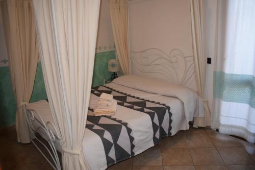 Imagen de la habitación del Hotel Il Platano, San Teodoro . Foto 5
