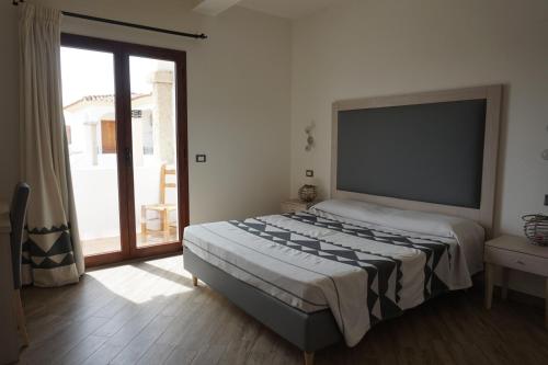 Imagen de la habitación del Hotel Il Platano, San Teodoro . Foto 9