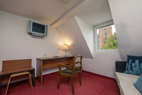 Imagen de la habitación del Hotel Il Portico de Notre Dame. Foto 6
