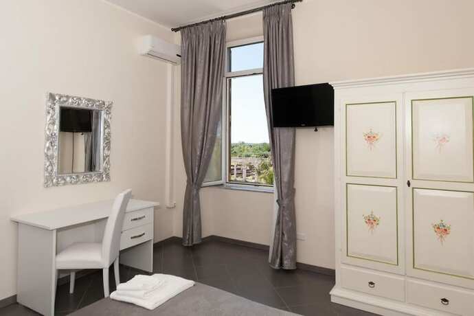 Imagen de la habitación del Hotel Il Postiglione. Foto 20