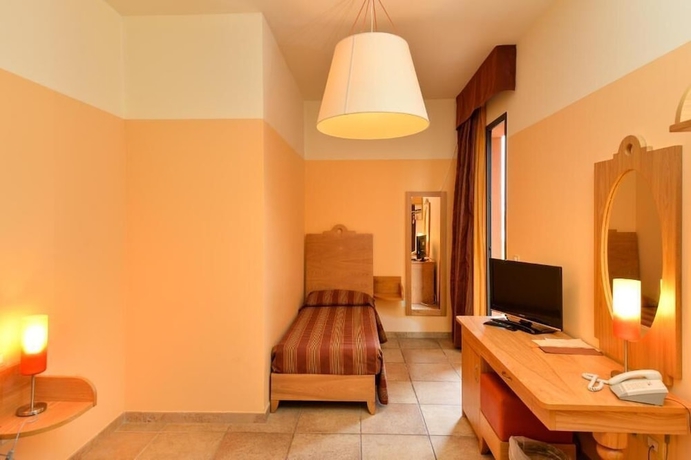 Imagen de la habitación del Hotel Il Tabacchificio. Foto 9