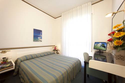 Imagen de la habitación del Hotel Il Telamonio. Foto 10