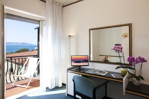 Imagen de la habitación del Hotel Il Telamonio. Foto 11