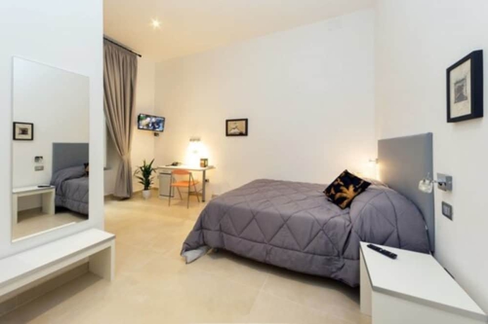 Imagen de la habitación del Hotel Il Tesoro Smart Suite and Spa. Foto 6