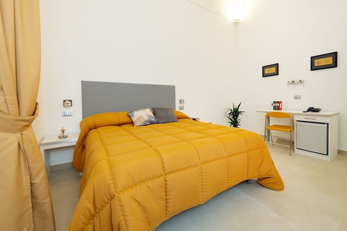 Imagen de la habitación del Hotel Il Tesoro Smart Suite and Spa. Foto 7