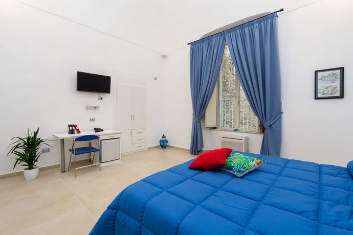 Imagen de la habitación del Hotel Il Tesoro Smart Suite and Spa. Foto 9