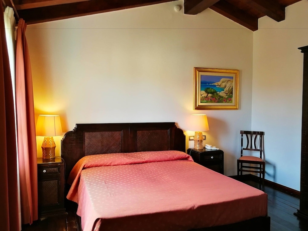 Imagen de la habitación del Hotel Il Vecchio Mulino. Foto 3