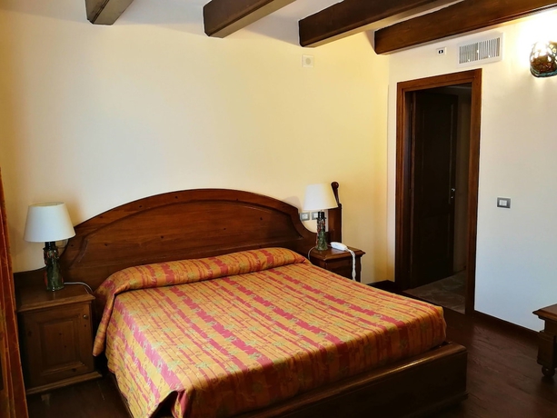 Imagen de la habitación del Hotel Il Vecchio Mulino. Foto 5