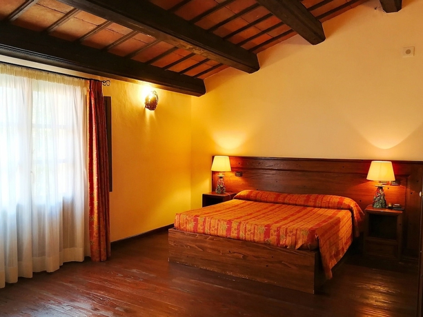 Imagen de la habitación del Hotel Il Vecchio Mulino. Foto 6