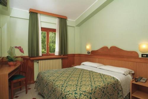 Imagen de la habitación del Hotel Il Vecchio Pescatore. Foto 8