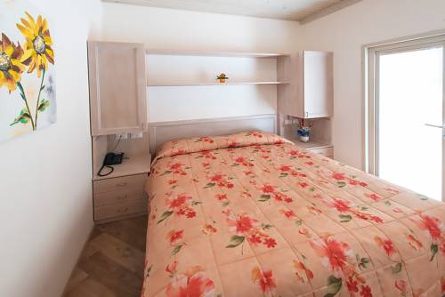 Imagen de la habitación del Hotel Il Villaggio Di Giuele. Foto 10