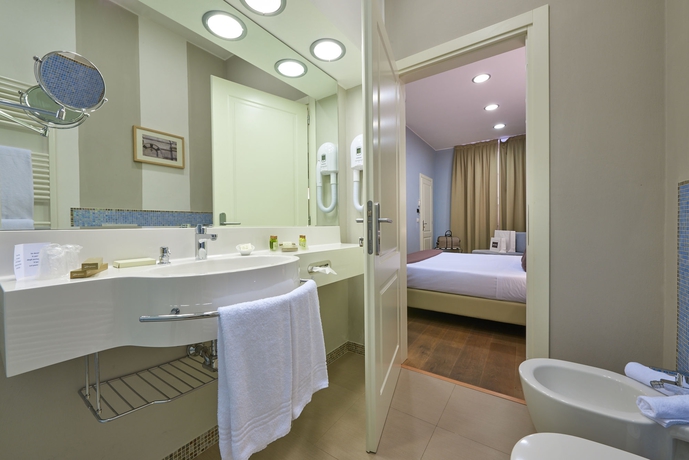 Imagen de la habitación del Hotel Ilaria, Lucca. Foto 7