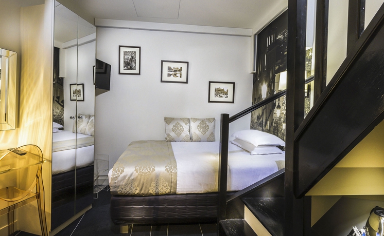 Imagen de la habitación del Hotel Ile De France Opéra. Foto 7