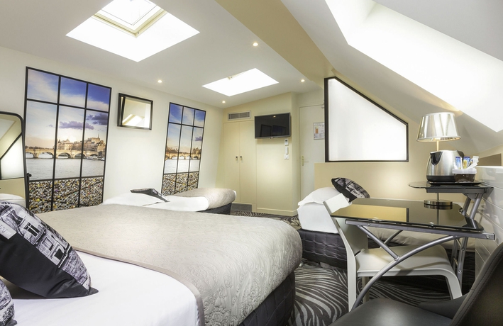 Imagen de la habitación del Hotel Ile De France Opéra. Foto 8