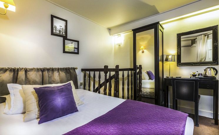 Imagen de la habitación del Hotel Ile De France Opéra. Foto 11