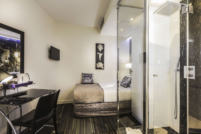 Imagen de la habitación del Hotel Ile De France Opéra. Foto 13