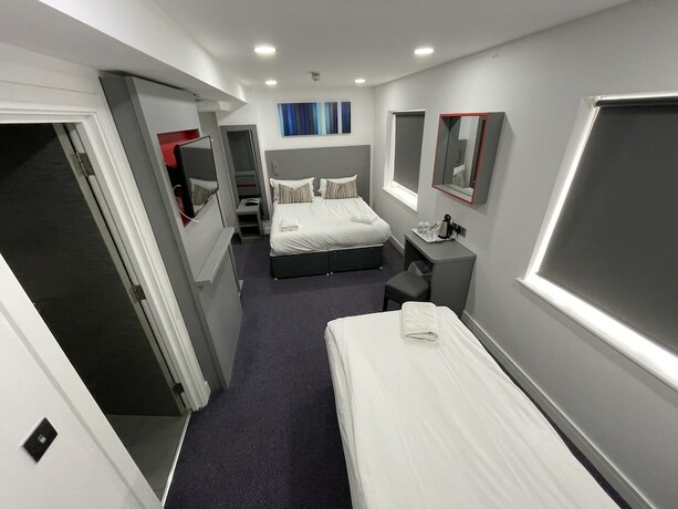 Imagen de la habitación del Hotel Ilford Grand Hotel. Foto 19