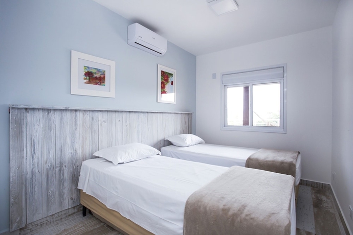 Imagen de la habitación del Hotel Ilhabela Beach Residences. Foto 7