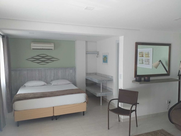 Imagen de la habitación del Hotel Ilhabela Beach Residences. Foto 10