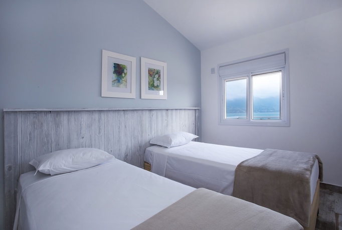 Imagen de la habitación del Hotel Ilhabela Beach Residences. Foto 12