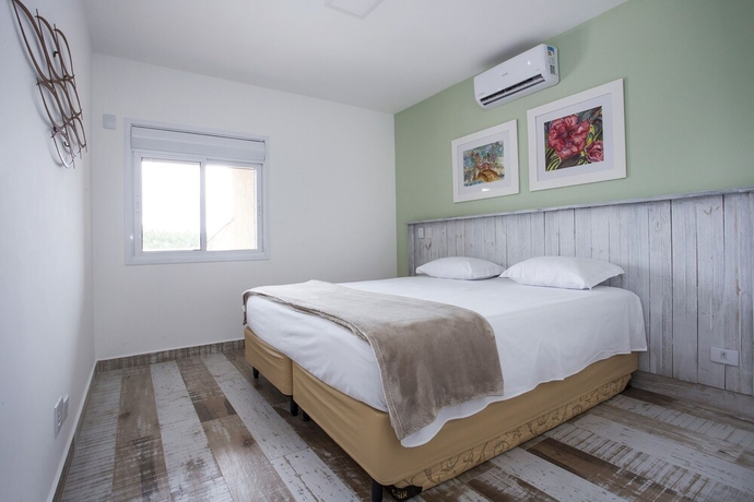 Imagen de la habitación del Hotel Ilhabela Beach Residences. Foto 14