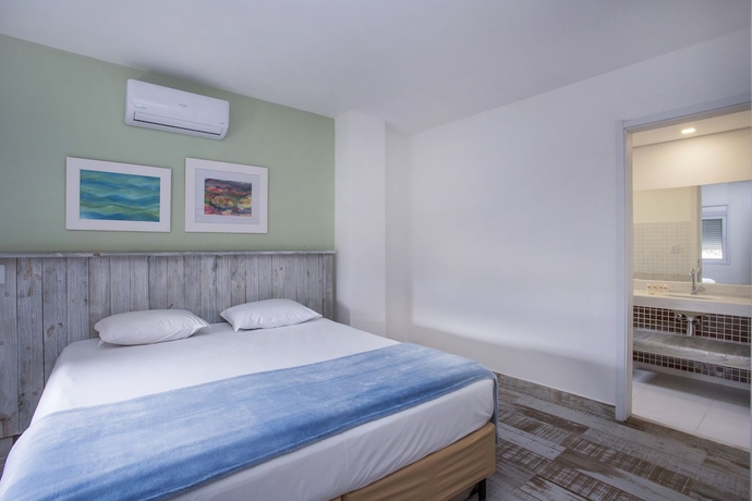 Imagen de la habitación del Hotel Ilhabela Beach Residences. Foto 16
