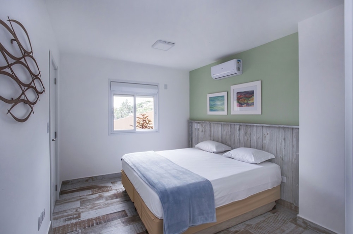 Imagen de la habitación del Hotel Ilhabela Beach Residences. Foto 17