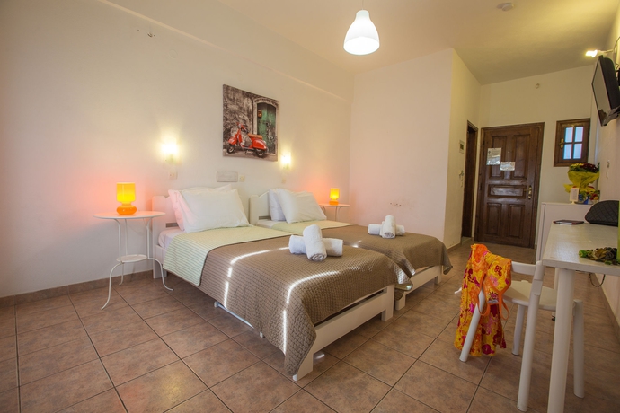 Imagen de la habitación del Hotel Iliada Odysseas Resort. Foto 6